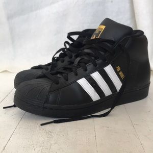 Adidas Superstar high top black and white